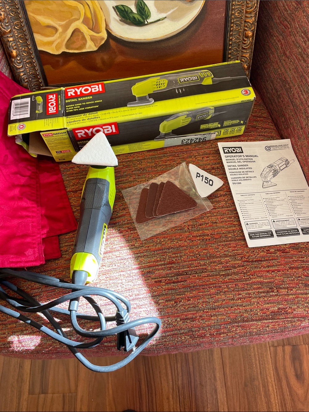 Ryobi Green and Gray Detail Sander with Triangle Sanding Pads